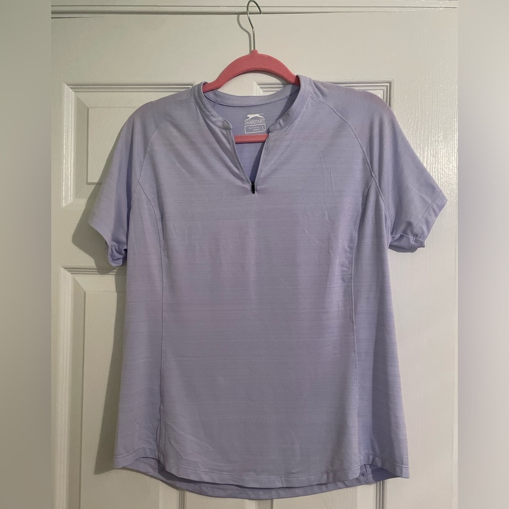 Golf or Tennis Shirt. Was worn once. In great condition and very comfortable.